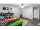 Bright bedroom with gray flooring and a double door closet at 2305 Se 8Th St, Ocala, FL 34471