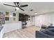 Game room with large TV, comfortable seating, and ample storage at 2305 Se 8Th St, Ocala, FL 34471