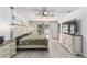 Large main bedroom with king bed, access to the backyard, and plenty of light at 2305 Se 8Th St, Ocala, FL 34471