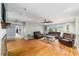 Bright living room with hardwood floors, fireplace and access to backyard at 2305 Se 8Th St, Ocala, FL 34471