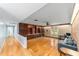 Bright Gathering room features hardwood floors, built-in shelving, and a brick accent wall at 2305 Se 8Th St, Ocala, FL 34471