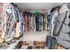 Large walk-in closet with plenty of shelving and hanging space for clothes and shoes at 2305 Se 8Th St, Ocala, FL 34471