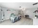 Bedroom with gray flooring, ceiling fan, and a vanity area at 2305 Se 8Th St, Ocala, FL 34471