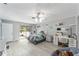 Bright bedroom with patio access, a vanity, and plenty of space at 2305 Se 8Th St, Ocala, FL 34471
