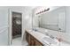 Bathroom boasts dual sinks and updated vanity at 2305 Se 8Th St, Ocala, FL 34471