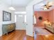 Entryway with hardwood floors, a mirror, and an open view to the living room at 15890 Sw 11Th Terrace Rd, Ocala, FL 34473