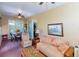 Spacious sunroom with comfortable seating area and a view of the patio at 15890 Sw 11Th Terrace Rd, Ocala, FL 34473