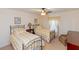 Guest bedroom with two twin beds and ceiling fan at 15890 Sw 11Th Terrace Rd, Ocala, FL 34473