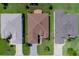 Three homes viewed from above, showcasing architectural styles and landscaping at 15890 Sw 11Th Terrace Rd, Ocala, FL 34473