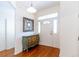 Bright entryway with hardwood floors, a mirror, and a dresser at 15890 Sw 11Th Terrace Rd, Ocala, FL 34473