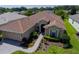 Single-Gathering home with landscaped yard and paver driveway at 15890 Sw 11Th Terrace Rd, Ocala, FL 34473