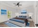Virtually staged bedroom with a comfortable bed and window at 5 Emerald Trl, Ocala, FL 34472