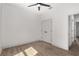 Bright bedroom with double doors and hardwood floors at 5 Emerald Trl, Ocala, FL 34472