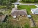 Aerial view of the back of the house, showcasing its yard at 49 Fisher Way, Ocklawaha, FL 32179