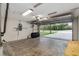 Garage with open overhead door and space for storage at 49 Fisher Way, Ocklawaha, FL 32179