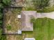 Aerial view of home, showing large backyard and driveway at 49 Fisher Way, Ocklawaha, FL 32179