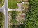 An aerial view of a house with a large yard at 49 Fisher Way, Ocklawaha, FL 32179
