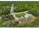 Aerial view of house and surrounding neighborhood at 49 Fisher Way, Ocklawaha, FL 32179