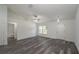 Spacious living area with hardwood floors and access to bathroom at 1 Pine Trace Trl, Ocala, FL 34472