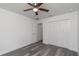 Bright bedroom with double door closet and ceiling fan at 1 Pine Trace Trl, Ocala, FL 34472