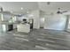 Open kitchen with island and stainless steel appliances at 1 Pine Trace Trl, Ocala, FL 34472