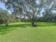 Spacious backyard with picnic table and grill at 11831 Sw Highway 484, Dunnellon, FL 34432