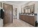Bathroom with double vanity and ample storage at 11831 Sw Highway 484, Dunnellon, FL 34432