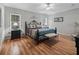 Main bedroom with a king-size bed and an ensuite bathroom at 11831 Sw Highway 484, Dunnellon, FL 34432