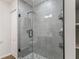 Bathroom with a large walk-in shower and pebble floor at 11831 Sw Highway 484, Dunnellon, FL 34432