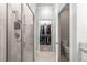 Bathroom with a walk-in shower and a view into a large closet at 9793 Sw 63Rd Loop, Ocala, FL 34481