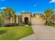 Two-story house with attached garage and well manicured lawn at 9793 Sw 63Rd Loop, Ocala, FL 34481