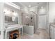 Elegant bathroom with a walk-in shower, double vanity, and separate toilet at 9793 Sw 63Rd Loop, Ocala, FL 34481