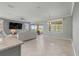 Bright and airy living room with sliding glass doors leading to a patio at 9793 Sw 63Rd Loop, Ocala, FL 34481
