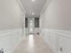 Bright and spacious entryway with elegant wainscoting at 9793 Sw 63Rd Loop, Ocala, FL 34481