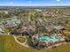Aerial view of community amenities, including pool and clubhouse at 9793 Sw 63Rd Loop, Ocala, FL 34481
