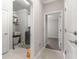 Hallway with laundry room access and additional rooms at 9793 Sw 63Rd Loop, Ocala, FL 34481