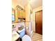 Bathroom with shower/tub combo and updated vanity at 1779 Ne 12Th St, Ocala, FL 34470