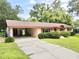 Home exterior, carport and driveway at 1779 Ne 12Th St, Ocala, FL 34470