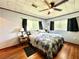 Bright bedroom with hardwood floors and ample natural light at 1779 Ne 12Th St, Ocala, FL 34470