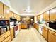 Galley-style kitchen with ample cabinetry and counter space at 1779 Ne 12Th St, Ocala, FL 34470