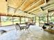 Spacious screened porch overlooking the backyard at 1779 Ne 12Th St, Ocala, FL 34470