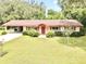 Ranch style home with carport and large yard at 1779 Ne 12Th St, Ocala, FL 34470