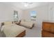 Guest bedroom with twin beds and plenty of closet space at 7137 & 7141 S Magnolia Ave, Ocala, FL 34476