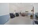 Spacious living room with comfortable seating and a fireplace at 7137 & 7141 S Magnolia Ave, Ocala, FL 34476