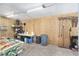 Workshop with tools, shelving, and supplies at 7137 & 7141 S Magnolia Ave, Ocala, FL 34476