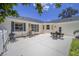 Large patio with two seating areas and plenty of space for entertaining at 7137 & 7141 S Magnolia Ave, Ocala, FL 34476