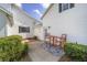 Small patio with bistro set, perfect for morning coffee at 7137 & 7141 S Magnolia Ave, Ocala, FL 34476
