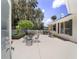 Spacious patio with seating area, grill, and access to the pool at 7137 & 7141 S Magnolia Ave, Ocala, FL 34476