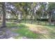 Black rail fence running along the property line at 7137 & 7141 S Magnolia Ave, Ocala, FL 34476