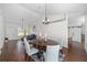 Bright dining room with a farmhouse style table and chairs at 7137 & 7141 S Magnolia Ave, Ocala, FL 34476